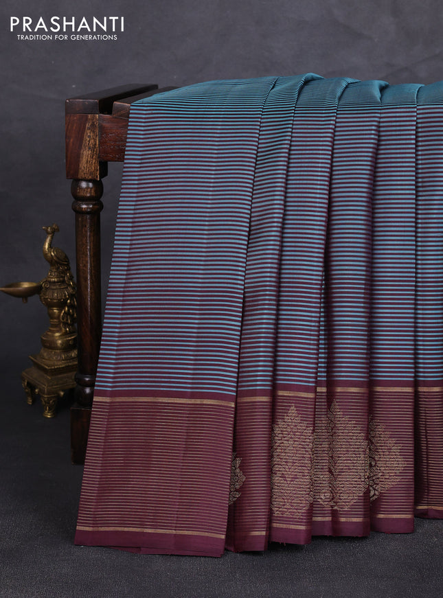 Pure kanchipuram silk saree teal blue and coffee brown with allover stripe pattern and zari woven border