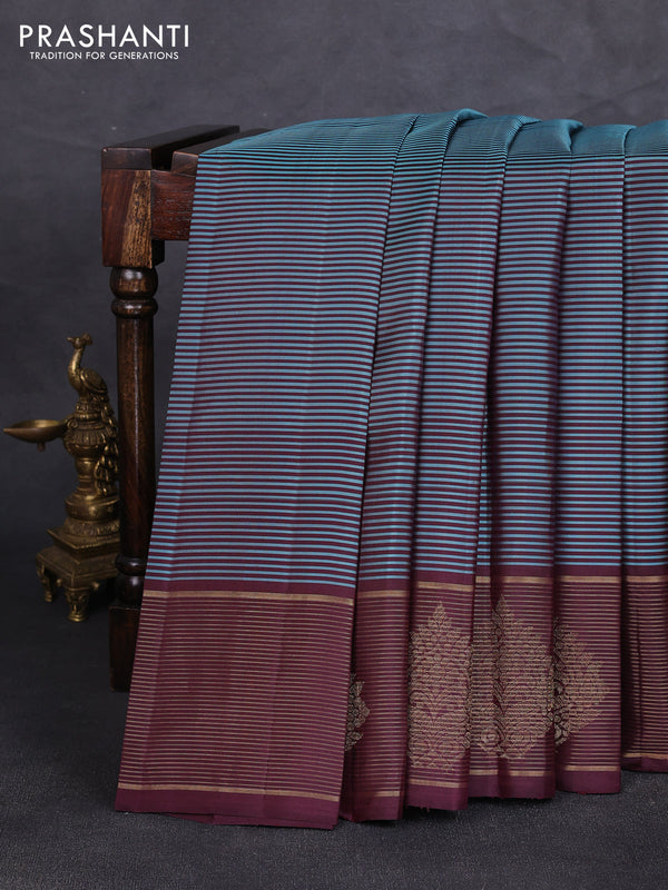 Pure kanchipuram silk saree teal blue and coffee brown with allover stripe pattern and zari woven border