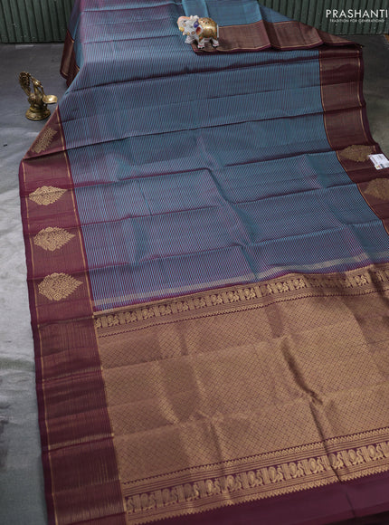 Pure kanchipuram silk saree teal blue and coffee brown with allover stripe pattern and zari woven border