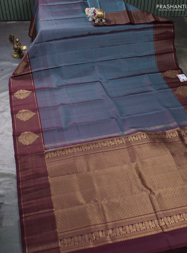 Pure kanchipuram silk saree teal blue and coffee brown with allover stripe pattern and zari woven border