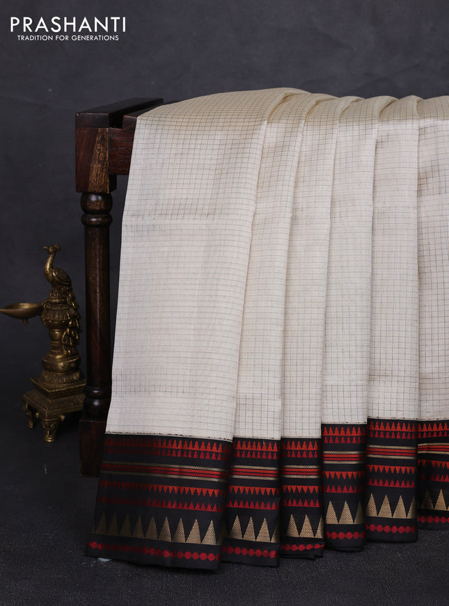 Pure kanchipuram silk saree cream and black with allover zari checked pattern and woven border
