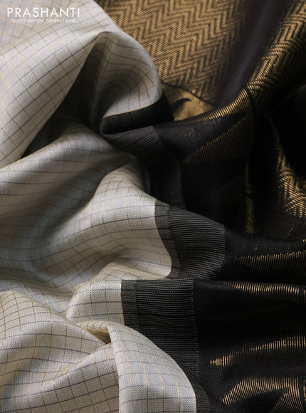 Pure kanchipuram silk saree cream and black with allover zari checked pattern and woven border