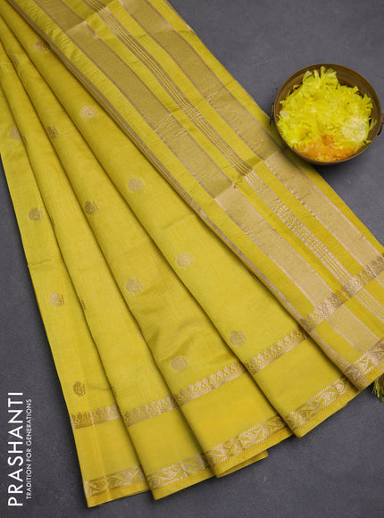 Semi raw silk saree yellow with allover zari woven buttas and rettapet zari woven border