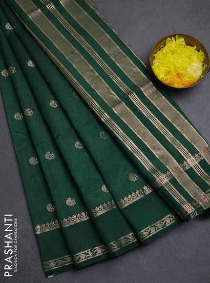 Semi raw silk saree bottle green with allover zari woven buttas and rettapet zari woven border