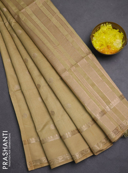 Semi raw silk saree sandal with allover zari woven buttas and rettapet zari woven border
