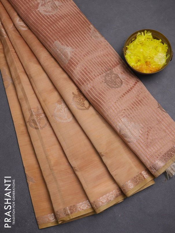 Semi raw silk saree peach shade with zari woven buttas and small zari woven border