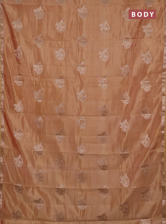 Semi raw silk saree peach shade with zari woven buttas and small zari woven border