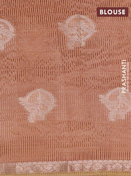Semi raw silk saree peach shade with zari woven buttas and small zari woven border