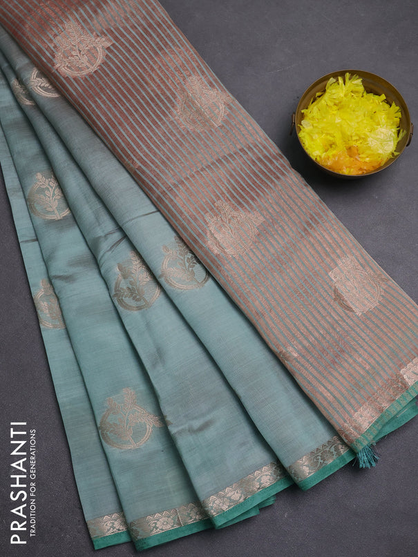 Semi raw silk saree pastel green with zari woven buttas and small zari woven border