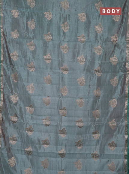 Semi raw silk saree pastel green with zari woven buttas and small zari woven border