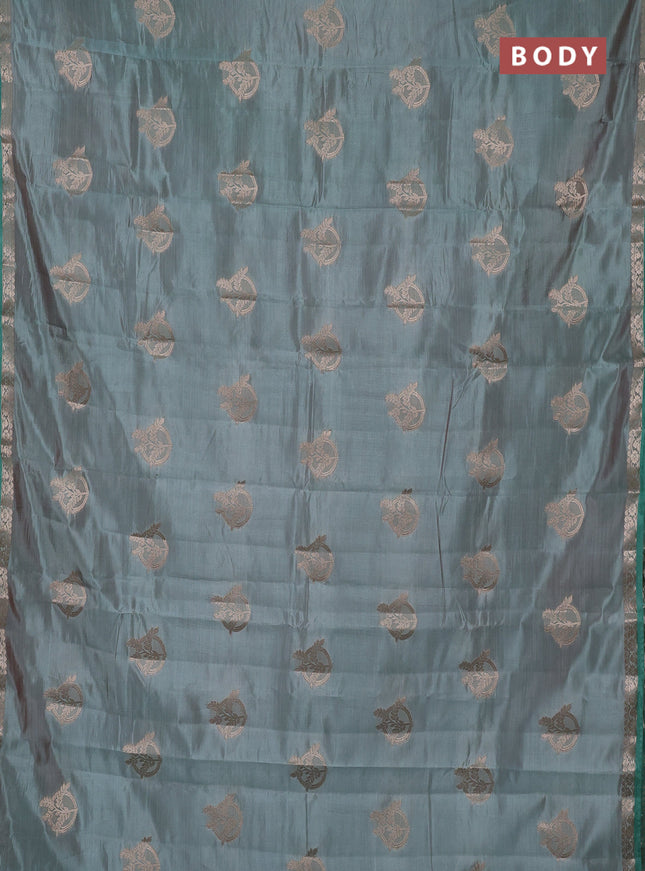 Semi raw silk saree pastel green with zari woven buttas and small zari woven border