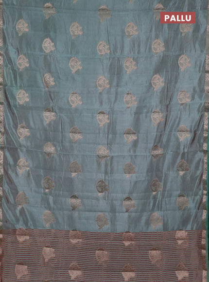 Semi raw silk saree pastel green with zari woven buttas and small zari woven border