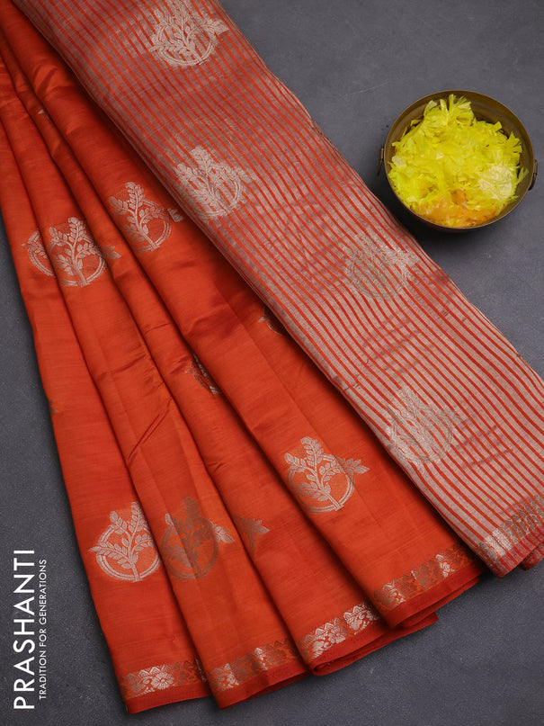 Semi raw silk saree rust shade with zari woven buttas and small zari woven border