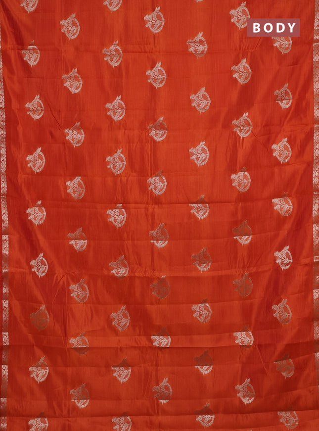 Semi raw silk saree rust shade with zari woven buttas and small zari woven border