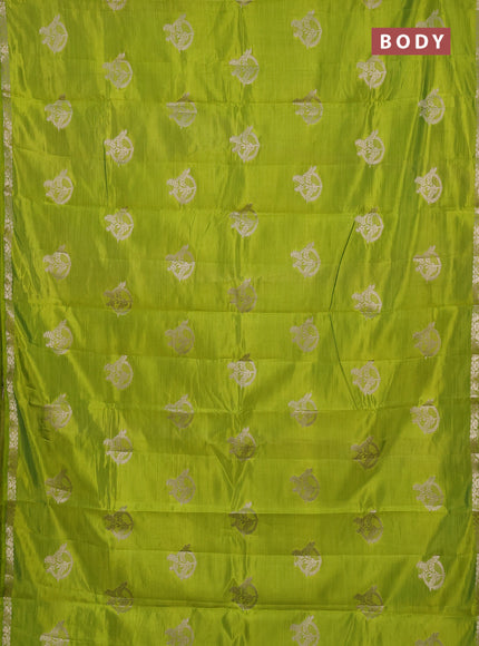 Semi raw silk saree light green with zari woven buttas and small zari woven border