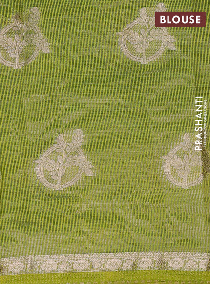 Semi raw silk saree light green with zari woven buttas and small zari woven border