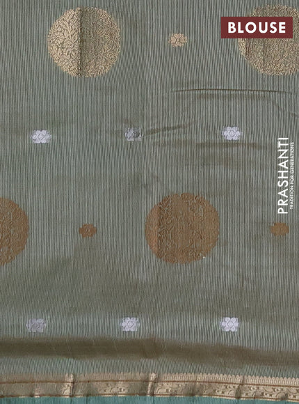 Semi raw silk saree pastel green with allover thread & zari woven floral buttas and small zari woven border