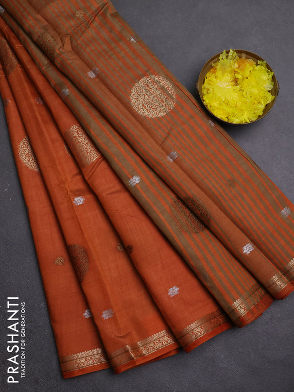 Semi raw silk saree rust shade with allover thread & zari woven floral buttas and small zari woven border