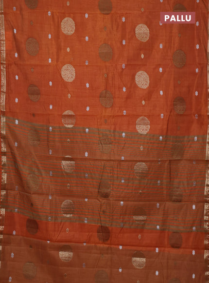 Semi raw silk saree rust shade with allover thread & zari woven floral buttas and small zari woven border