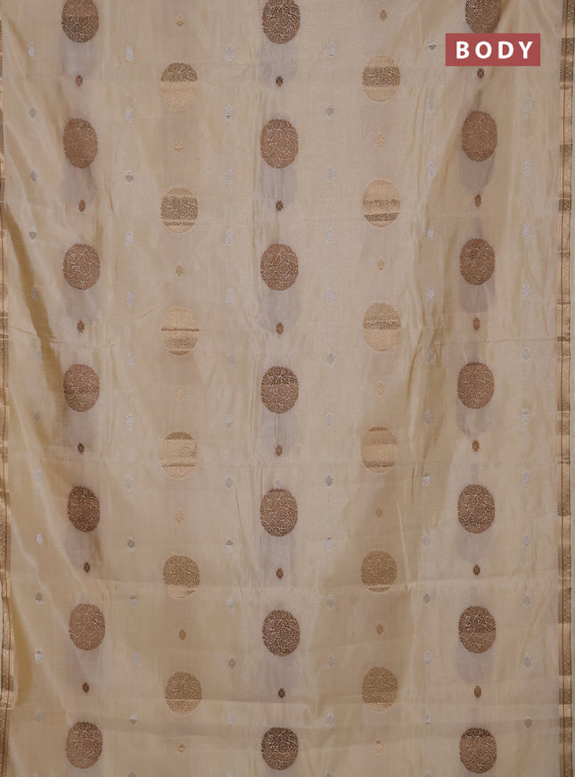 Semi raw silk saree cream with allover thread & zari woven floral buttas and small zari woven border