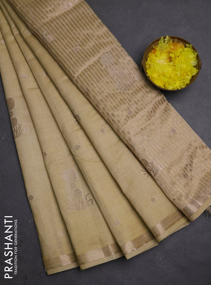 Semi raw silk saree beige with zari woven buttas and small zari woven border