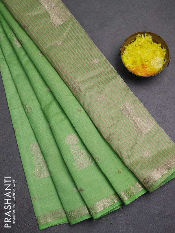 Semi raw silk saree light green with zari woven buttas and small zari woven border