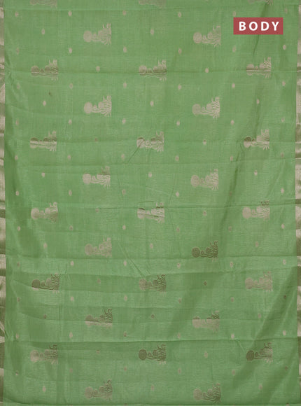 Semi raw silk saree light green with zari woven buttas and small zari woven border