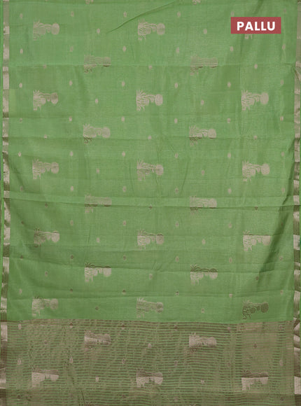 Semi raw silk saree light green with zari woven buttas and small zari woven border