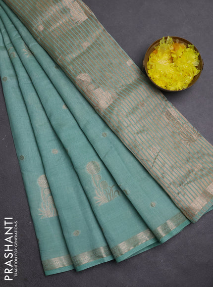 Semi raw silk saree pastel green with zari woven buttas and small zari woven border