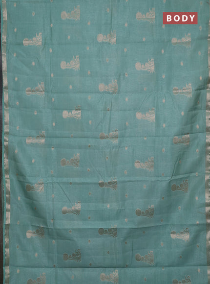 Semi raw silk saree pastel green with zari woven buttas and small zari woven border