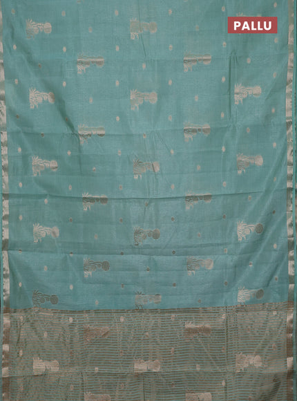 Semi raw silk saree pastel green with zari woven buttas and small zari woven border
