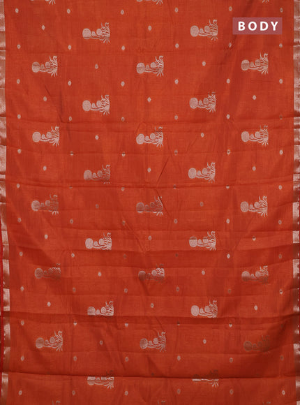 Semi raw silk saree rust shade with zari woven buttas and small zari woven border