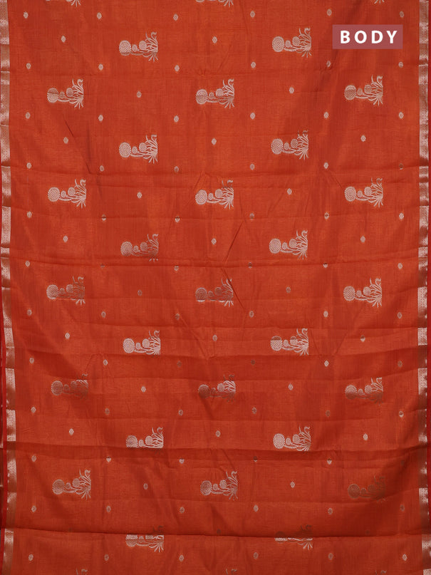 Semi raw silk saree rust shade with zari woven buttas and small zari woven border