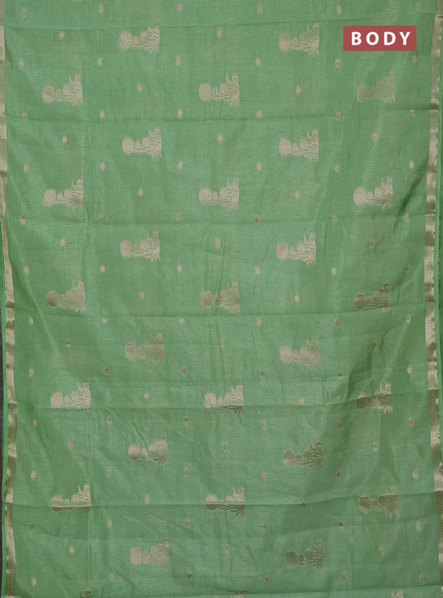 Semi raw silk saree light green shade with zari woven buttas and small zari woven border