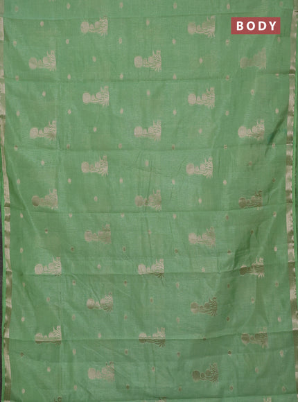Semi raw silk saree light green shade with zari woven buttas and small zari woven border