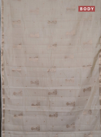 Semi raw silk saree cream with zari woven buttas and small zari woven border