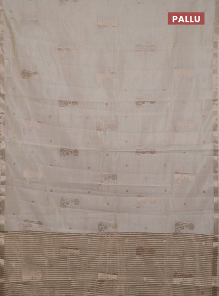 Semi raw silk saree cream with zari woven buttas and small zari woven border