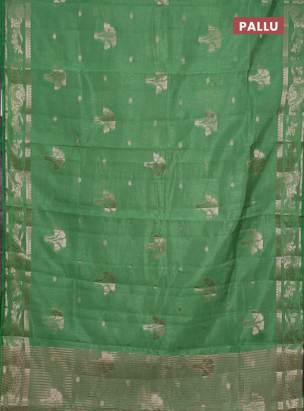 Semi raw silk saree light green with zari woven buttas and zari woven border