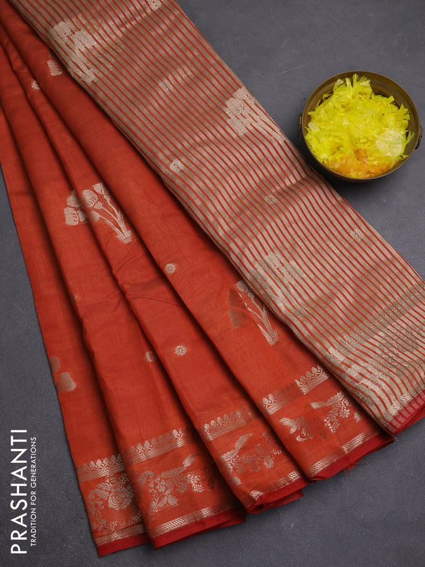 Semi raw silk saree rust shade with zari woven buttas and zari woven border
