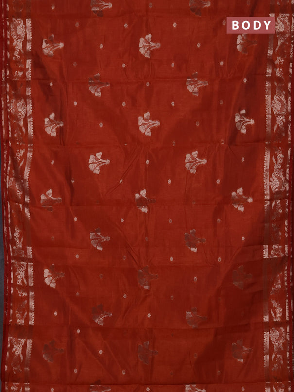 Semi raw silk saree rust shade with zari woven buttas and zari woven border
