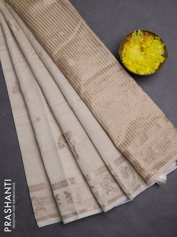 Semi raw silk saree cream with zari woven buttas and zari woven border