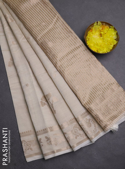 Semi raw silk saree cream with zari woven buttas and zari woven border