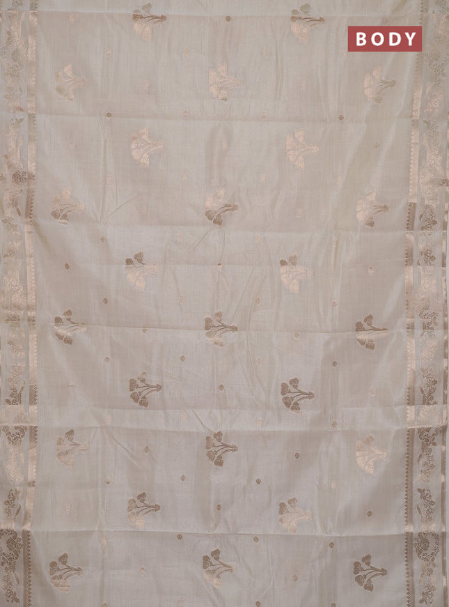 Semi raw silk saree cream with zari woven buttas and zari woven border