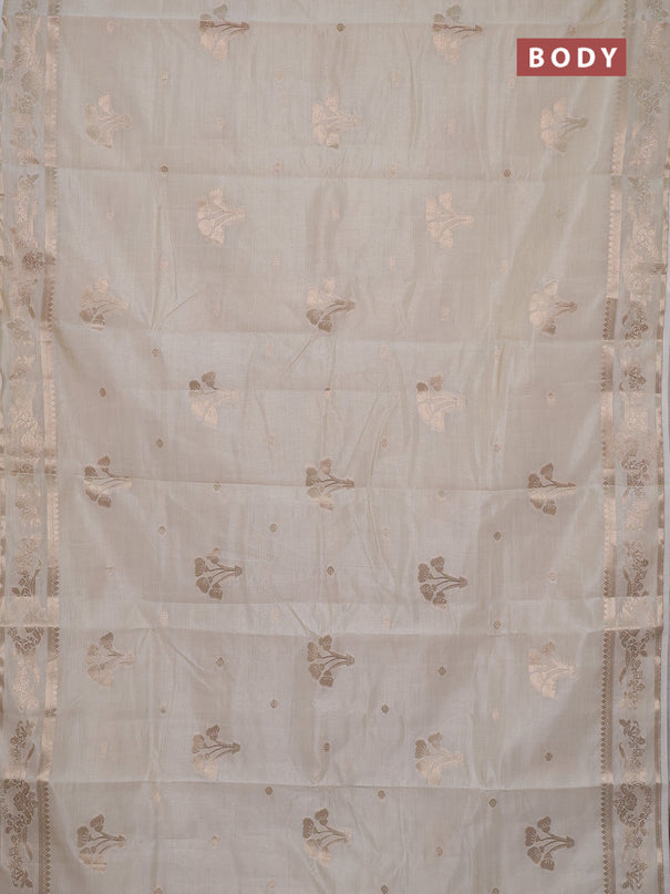 Semi raw silk saree cream with zari woven buttas and zari woven border