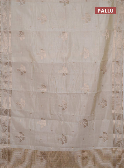 Semi raw silk saree cream with zari woven buttas and zari woven border