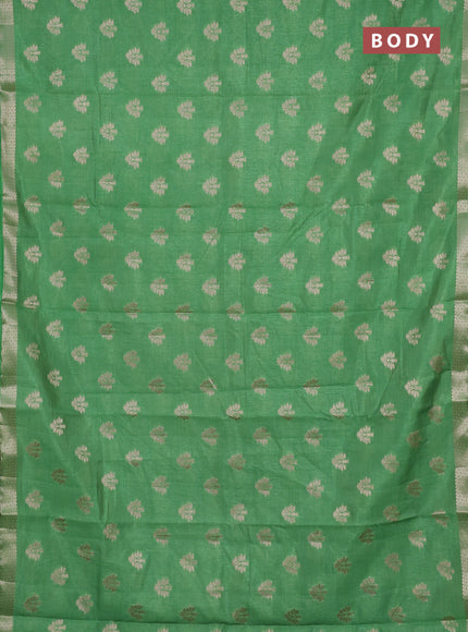 Semi raw silk saree light green with allover zari woven buttas and zari woven border