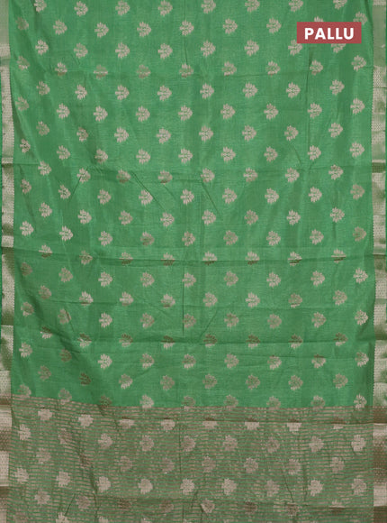 Semi raw silk saree light green with allover zari woven buttas and zari woven border