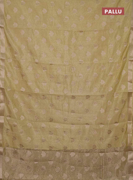 Semi raw silk saree beige with allover zari woven buttas and zari woven border