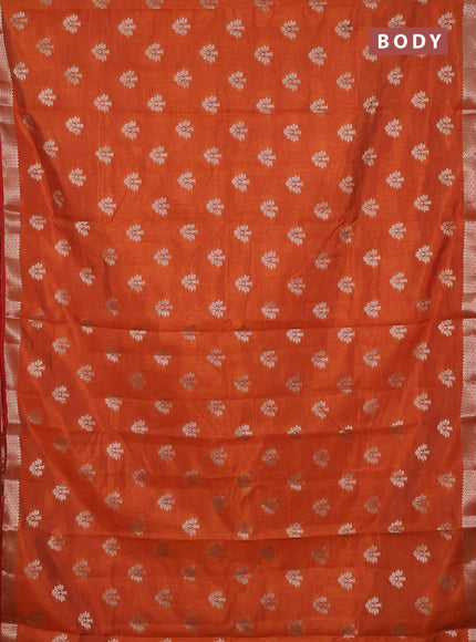 Semi raw silk saree rust shade with allover zari woven buttas and zari woven border