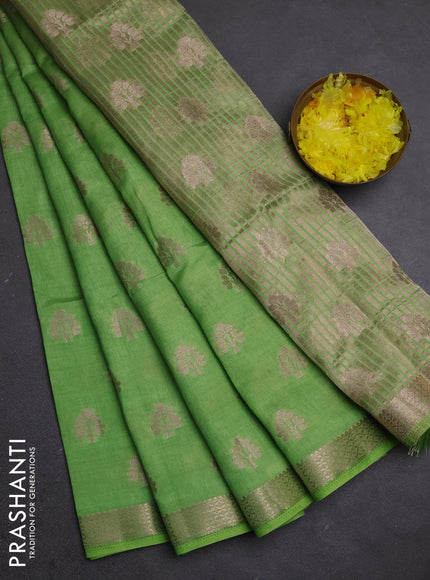 Semi raw silk saree light green with allover zari woven buttas and zari woven border